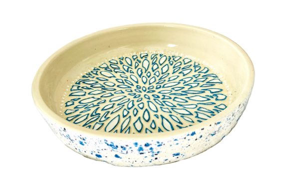 White clay body. Wheel and slab built. Jungle Gems external glaze. Internal hand painted textured base. Measurements: H-2in x Diameter-11in.