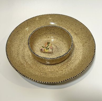 Speckled clay base chip-n-dip snack bowl. Hand painted polka dot details and heart applique. Clear glaze coating.  H-2in x Diameter-9in.